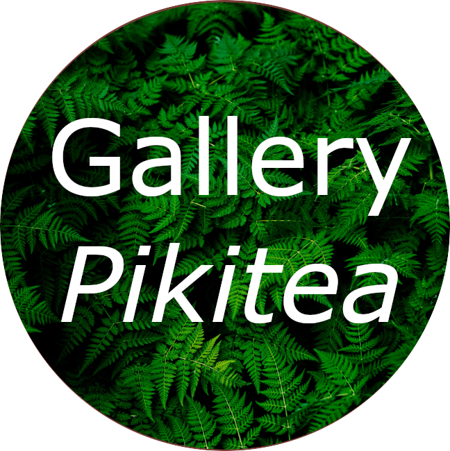 a stylised button with a fern leaf background